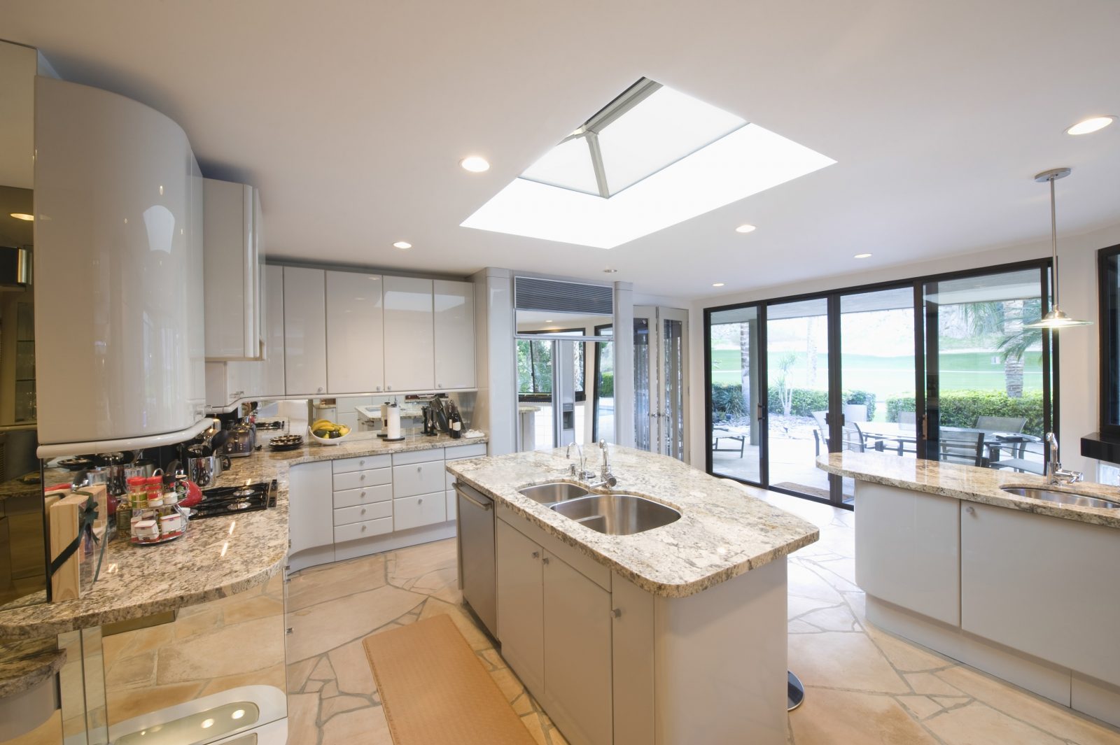 Ultrasky kitchen with marble tops and cream cupboards