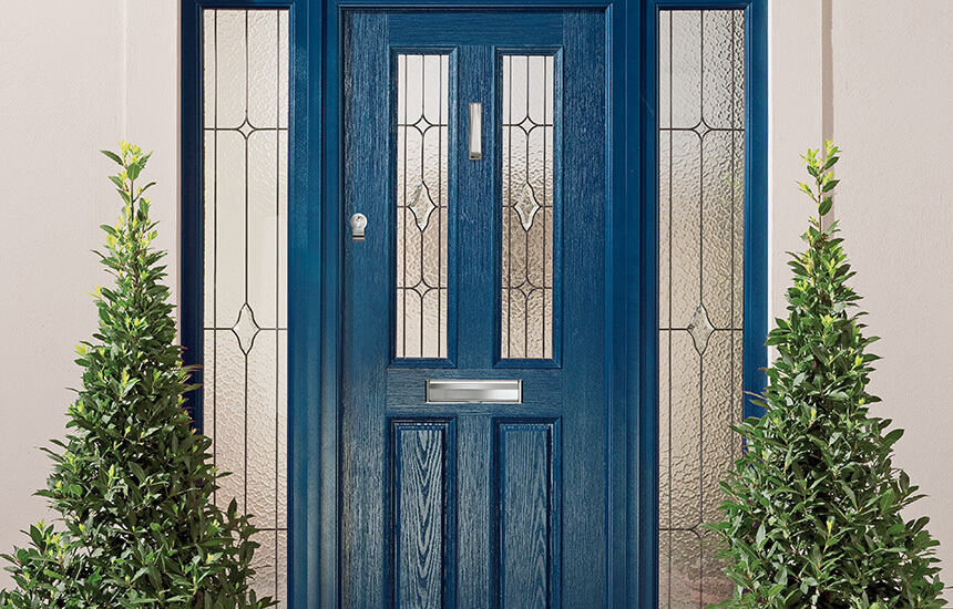 Dark blue wood effect front door.