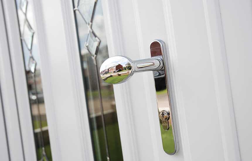 White uPVC entrance door close up