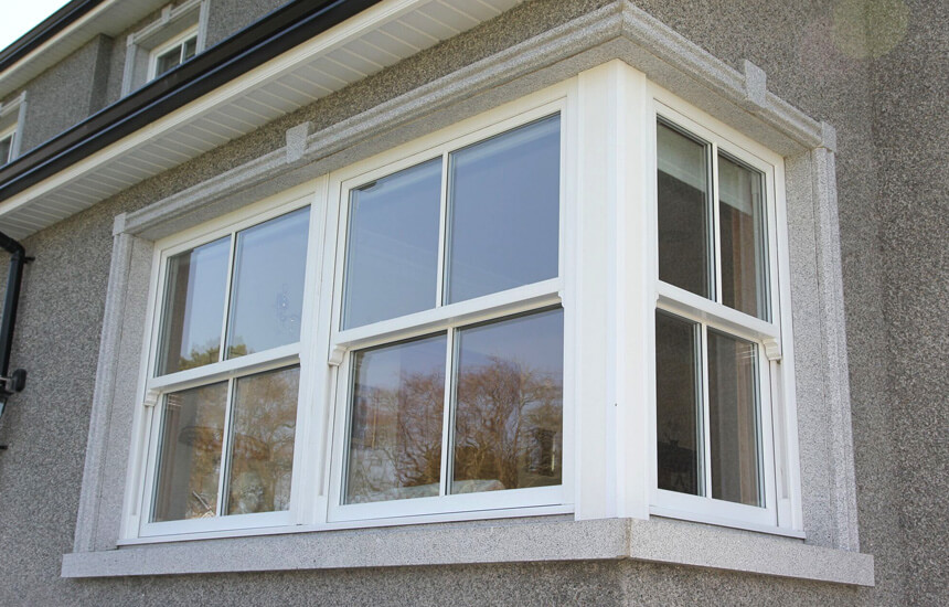 White sash windows on a corner