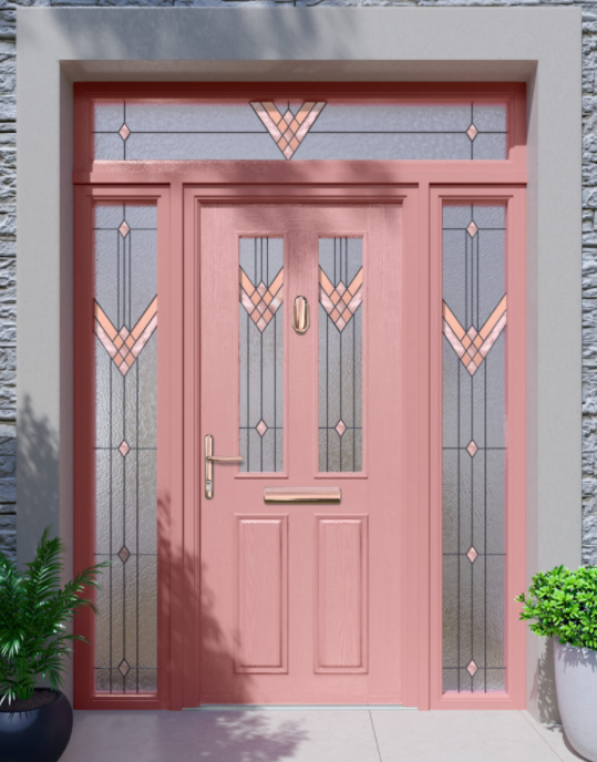 Pink front door with ornate window panels.