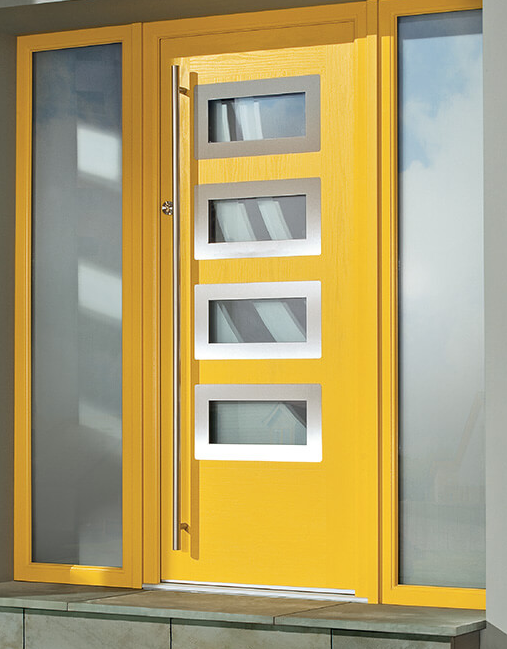 Yellow front door with large handle.