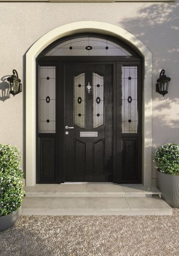 Ornate black front door.