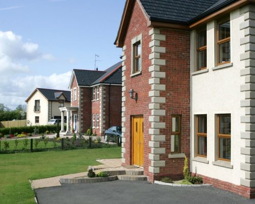 Bright front door with neutral windows