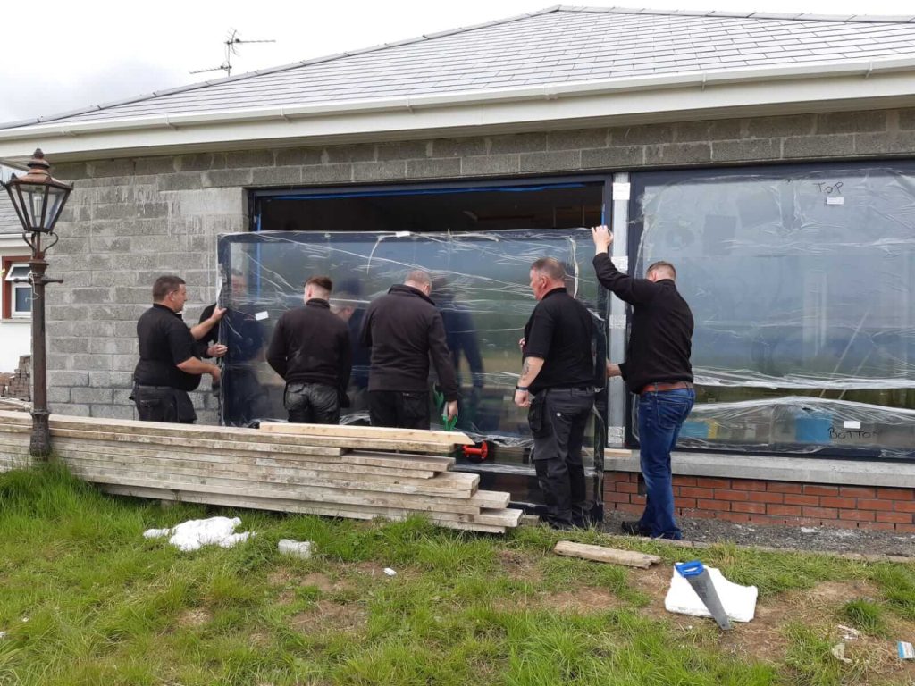 fitting large window to an extension