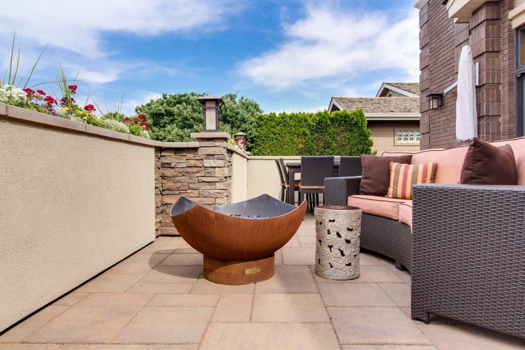 Outdoor furniture with cream tile flooring