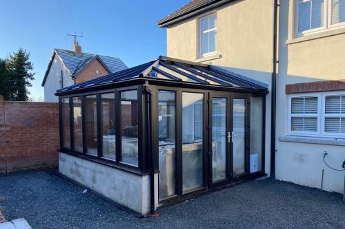 A black Upvc conservatory.