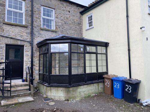 A black upvc conservatory