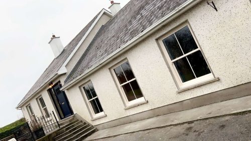 uPVC sliding sash windows in white