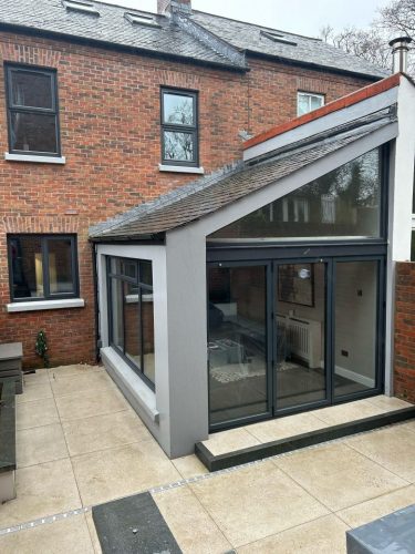 installation of bifold doors in progress