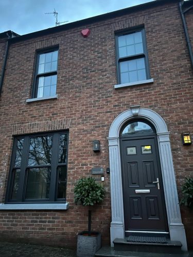 external view of black palladio composite front door - after installation