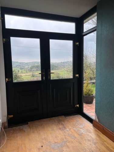 internal view black upvc porch with french doors - after installation