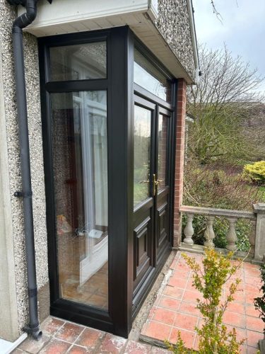 black upvc porch with french doors - after installation
