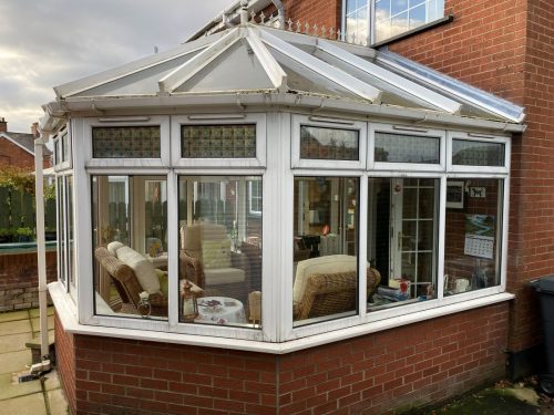 white upvc conservatory with polycarbonate roof - before