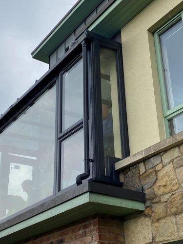 close-up external view of conservatory installation by Turkington Windows